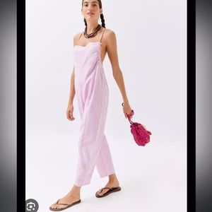 Urban outfitters pink brea distressed jumpsuit